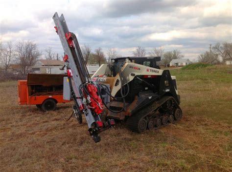 hydraulic rock drill for skid steer|skid steer rock drill attachment.